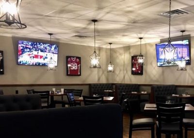 Interior With Pendant Lights And Sports Decor