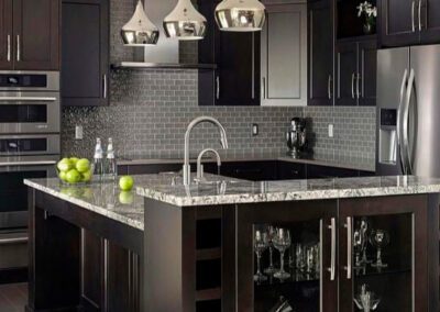 Modern Kitchen with Dark Cabinets and Silver Fixtures