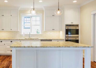 Modern Kitchen with Round Lights and Island